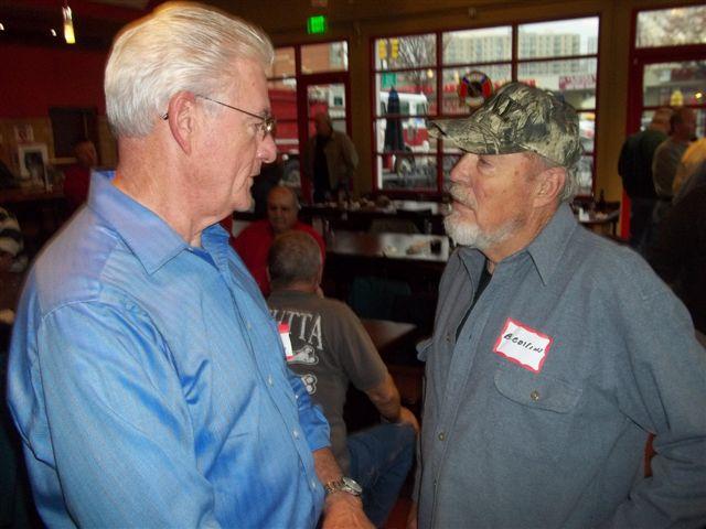 Two former/retired Silver Spring members chatting at 12/7/11 lunch: Jim LaMay and Bernie Collins